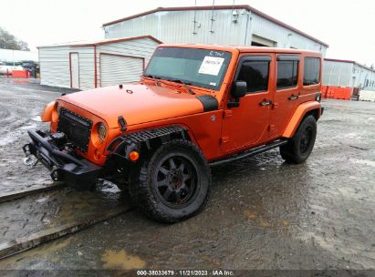 2011 JEEP WRANGLER UNLIMITED SAHARA Orange  Gasoline 1J4BA5H11BL516170 photo #3