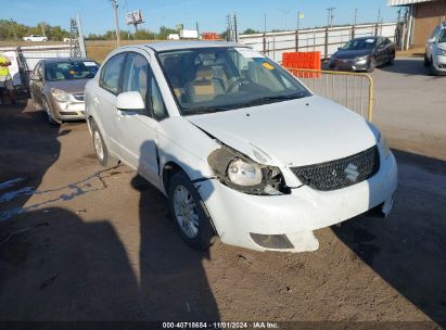 2012 SUZUKI SX4 LE/LE POPULAR White  Gasoline JS2YC5A34C6302754 photo #1