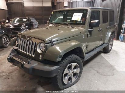 2016 JEEP WRANGLER UNLIMITED SAHARA Green  Flexible Fuel 1C4BJWEG2GL162090 photo #3