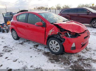 2012 TOYOTA PRIUS C THREE Red  Hybrid JTDKDTB35C1506086 photo #1