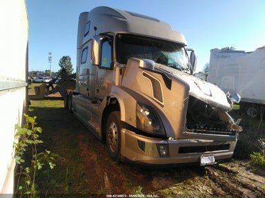2016 VOLVO VN VNL Gold  Diesel 4V4NC9EJ2GN958352 photo #1