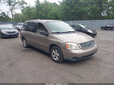 2004 FORD FREESTAR SES Gold  Gasoline 2FMZA57684BA11355 photo #1