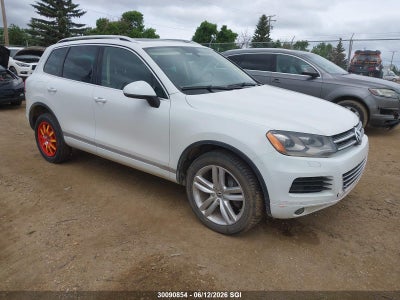 VOLKSWAGEN TOUAREG 2014. Lot# 30090854. VIN WVGEP9BP9ED012479. Photo 1