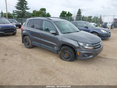 VOLKSWAGEN TIGUAN 2014. Lot# 30091622. VIN WVGJV3AX3EW518896. Photo 1