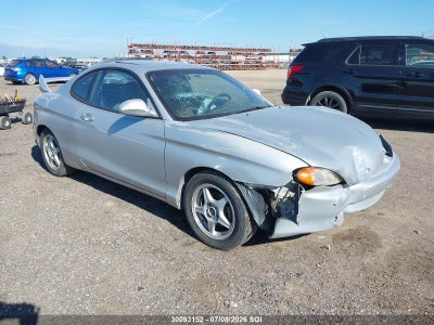 KMHJG34F3XU133771 HYUNDAI TIBURON Photo 1