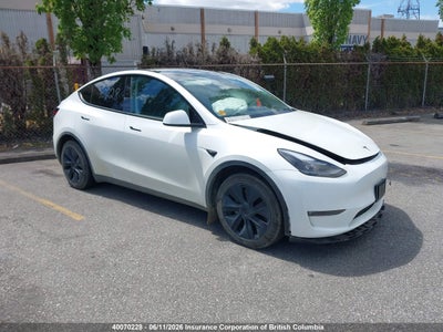 TESLA MODEL Y 2025. Lot# 40070228. VIN 7SAYGAEE1SF229464. Photo 1