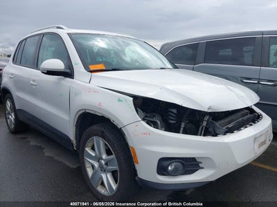 VOLKSWAGEN TIGUAN 2014. Lot# 40071941. VIN WVGJV3AX6EW521324. Photo 1