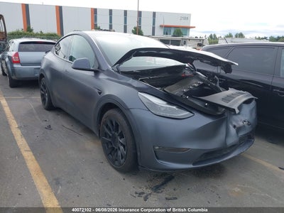 TESLA MODEL Y 2023. Lot# 40072102. VIN 7SAYGAEE8PF757980. Photo 1