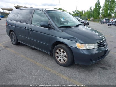 HONDA ODYSSEY 2004. Lot# 40072476. VIN 2HKRL18604H000439. Photo 1