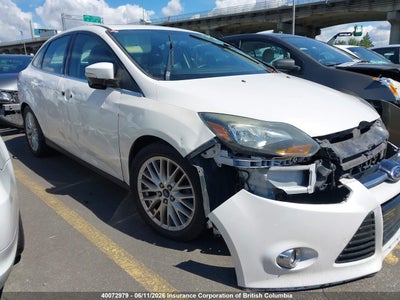 FORD FOCUS 2014. Lot# 40072979. VIN 1FADP3J29EL288899. Photo 1
