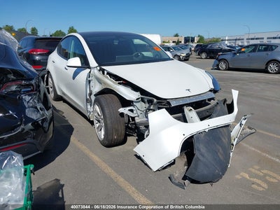 TESLA MODEL Y 2022. Lot# 40073844. VIN 7SAYGAEE9NF550401. Photo 1