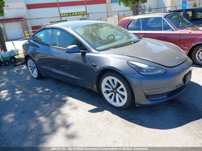 TESLA MODEL 3 2022. Lot# 40074119. VIN 5YJ3E1EB8NF295193. Photo 1