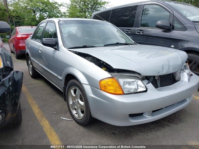 MAZDA PROTEGE 2000. Lot# 40071711. VIN JM1BJ2219Y0227545. Photo 1