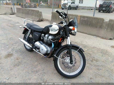 TRIUMPH MOTORCYCLE T100 2005. Lot# 34730927. VIN SMT910K115J222396. Photo 1
