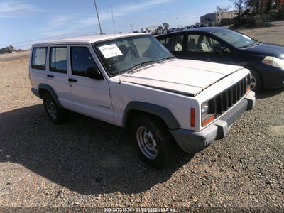 JEEP CHEROKEE RH DRIVE 1999. Lot# 34731834. VIN 1J4FN28S7XL526318. Photo 1