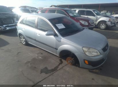 2009 Kia Rio blue vin: KNADE243096452203