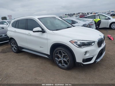 2017 BMW X1 VIN: WBXHT3Z33H4A55190