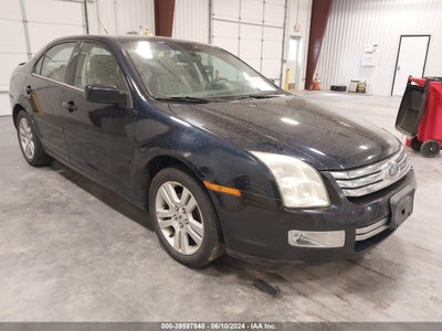 FORD FUSION-4 CYL. 2008. Lot# 39597848. VIN 3FAHPO8Z28R228567. Photo 1