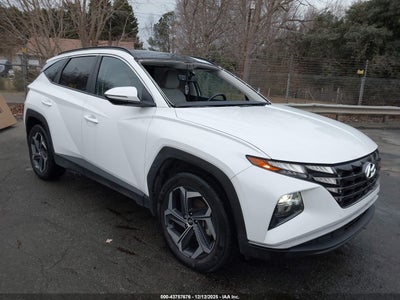 KM8JCCD10RU145332 HYUNDAI TUCSON HYBRID Photo 1