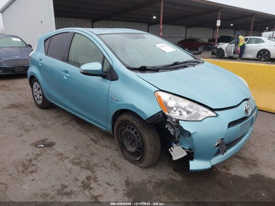 JTDKDTB39D1047565 TOYOTA PRIUS C Photo 1