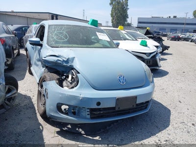 3VWJ17AT5EM634960 VOLKSWAGEN BEETLE Photo 1