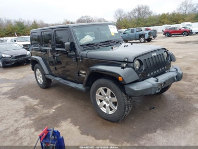 2012 Jeep Wrangler / Unlimited Sahara — VIN 1C4BJWEG9CL132305 salvage auction