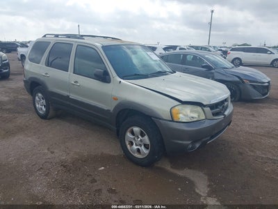 4F2CZ06164KM24148 MAZDA TRIBUTE Photo 1