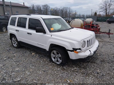 1C4NJPFB4ED767080 JEEP PATRIOT Photo 1