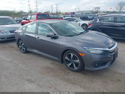 2017 Honda Civic 1.5 Touring grey Lot 111044867668 Vin 19XFC1F98HE015247