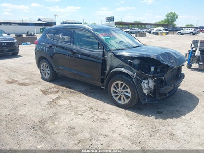 KM8J3CA41HU562889 HYUNDAI TUCSON Photo 1