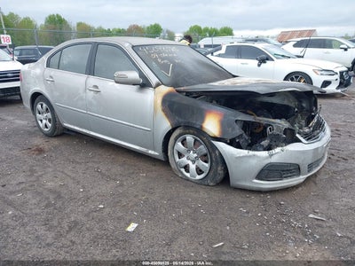 2009 Kia Optima 2.4 Lx silver Lot 111045098525 Vin KNAGE228095294575