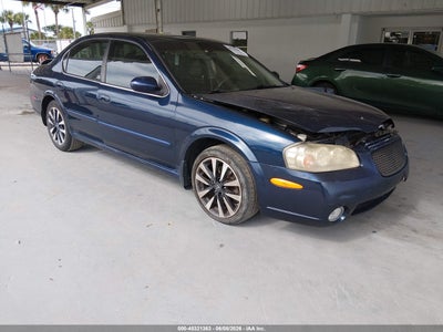 JN1DA31D12T414345 NISSAN MAXIMA Photo 1