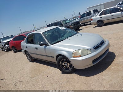JHMEJ6671VS028779 HONDA CIVIC Photo 1