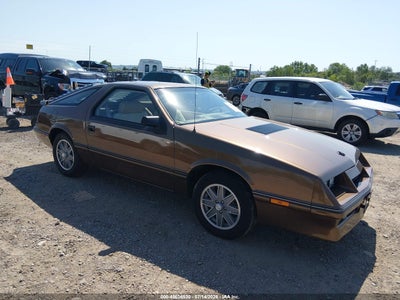 1C3BA54EXGG228702 CHRYSLER LASER Photo 1