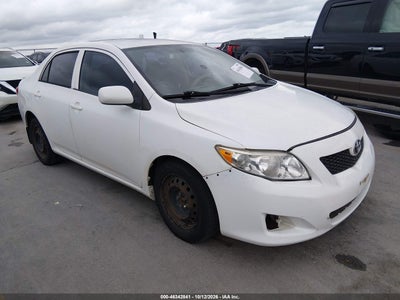 1NXBU4EE2AZ320063 TOYOTA COROLLA Photo 1