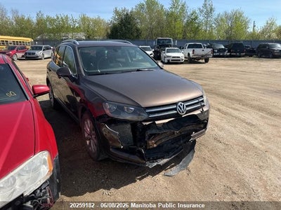 VOLKSWAGEN TOUAREG 2014. Lot# 20259182. VIN WVGEP9BP5ED001740. Photo 1