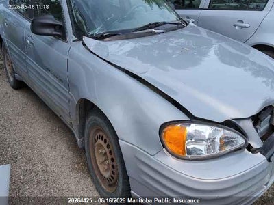 1G2NE52T4XC540105 PONTIAC GRAND AM Photo 1