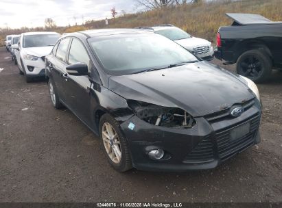 1FAHP3F23CL306059 FORD FOCUS Photo 1