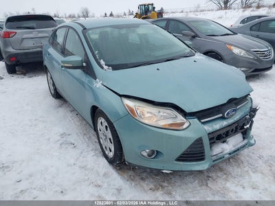 1FAHP3F21CL258934 FORD FOCUS Photo 1