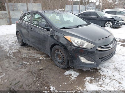 KMHD35LE6DU041899 HYUNDAI ELANTRA Photo 1
