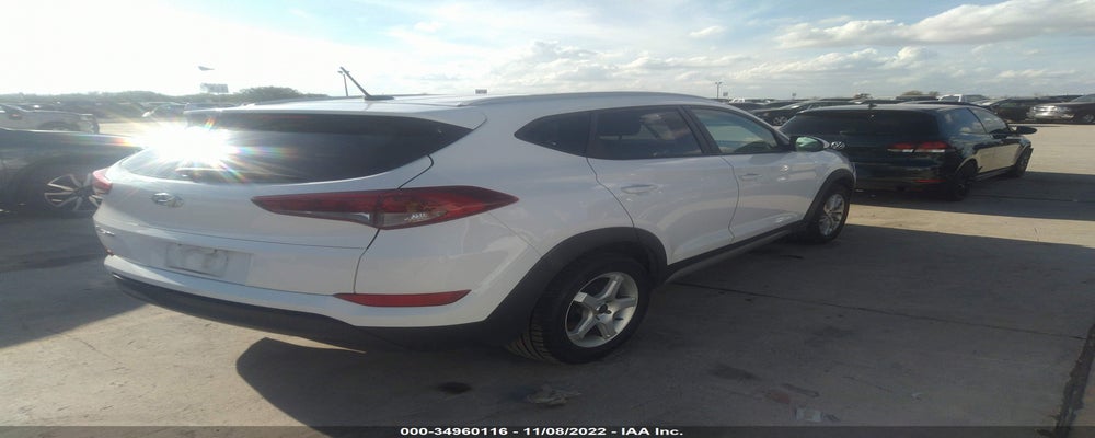 KM8J33A49HU279947 2017 HYUNDAI TUCSON photo no. 4