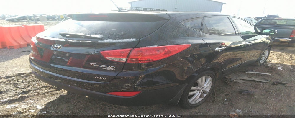 KM8JUCAC4DU611369 2013 HYUNDAI TUCSON photo no. 4