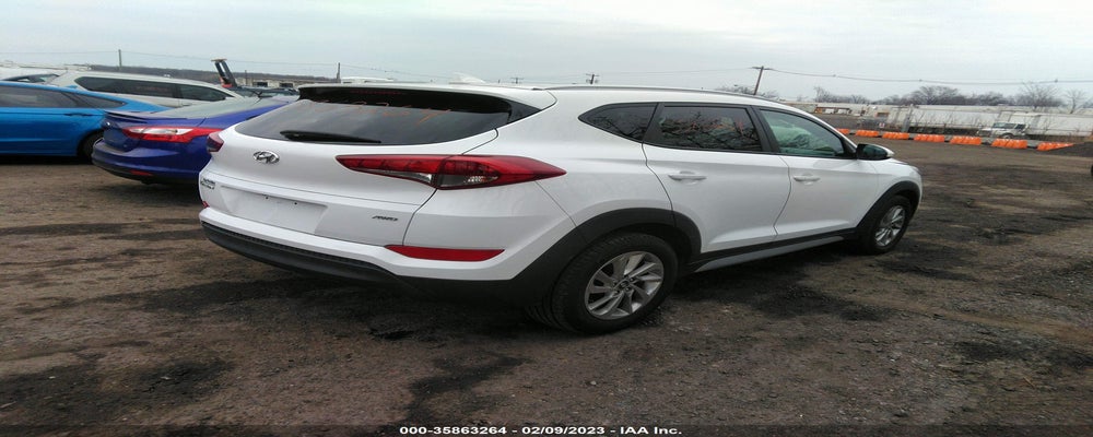 KM8J3CA48JU744658 2018 HYUNDAI TUCSON photo no. 4
