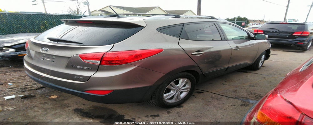 KM8JUCAC8CU471745 2012 HYUNDAI TUCSON photo no. 4