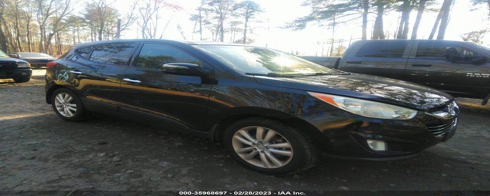 KM8JUCAC8CU543947 2012 HYUNDAI TUCSON photo no. 3