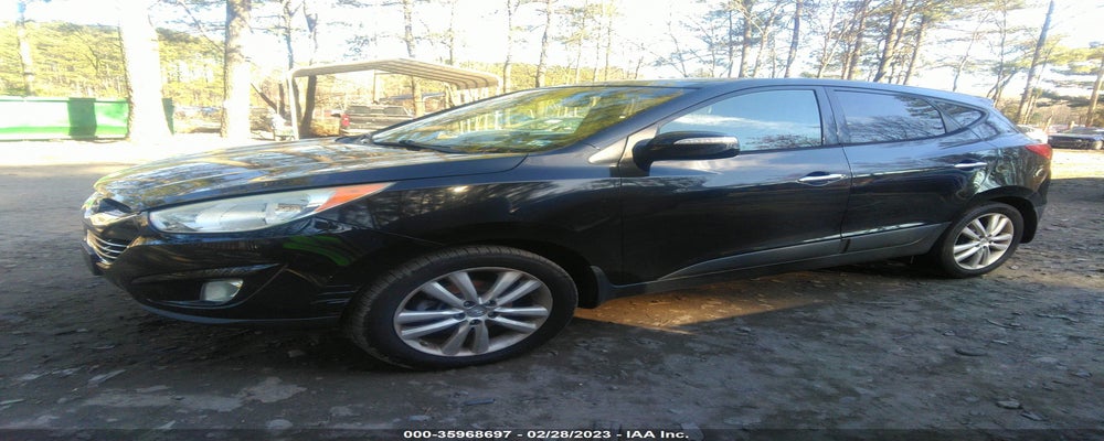 KM8JUCAC8CU543947 2012 HYUNDAI TUCSON photo no. 2