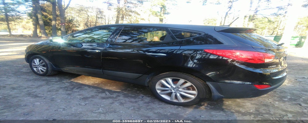 KM8JUCAC8CU543947 2012 HYUNDAI TUCSON photo no. 3