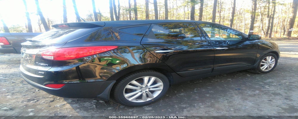 KM8JUCAC8CU543947 2012 HYUNDAI TUCSON photo no. 4