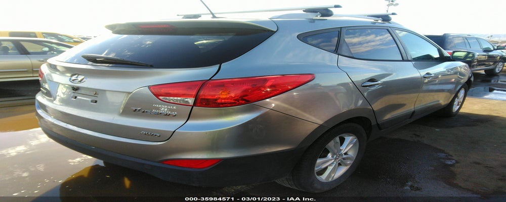 KM8JUCAC4CU444395 2012 HYUNDAI TUCSON photo no. 4
