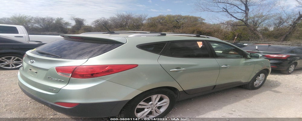 KM8JUCAC2CU511608 2012 HYUNDAI TUCSON photo no. 4